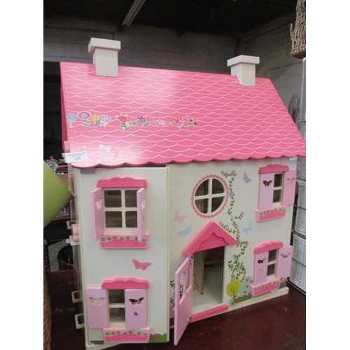 219 - PRETTY PINK DOLLS HOUSE AND SOME FURNITURE