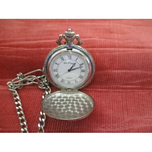 21 - SILVER COLOURED POCKET WATCH WITH HUNTING SCENE