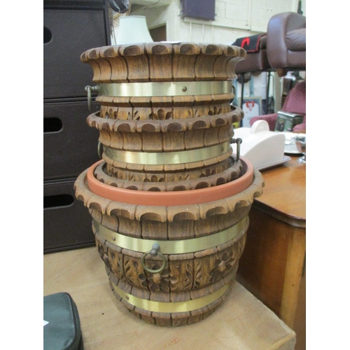 367 - 4 GRADUATING WOOD EFFECT PLANT POTS WITH METAL BANDING