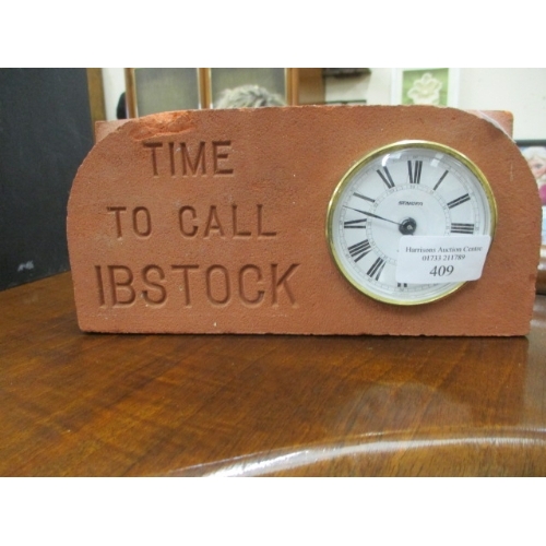 409 - CLOCK SET IN A BRICK WITH IMPRINT ' TIME TO CALL IBSTOCK