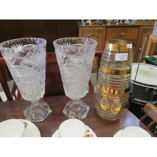 420 - PAIR OF LARGE CUT GLASS VASES ON STEMS AND A GLASS VASE WITH GOLDLEAF DETAIL