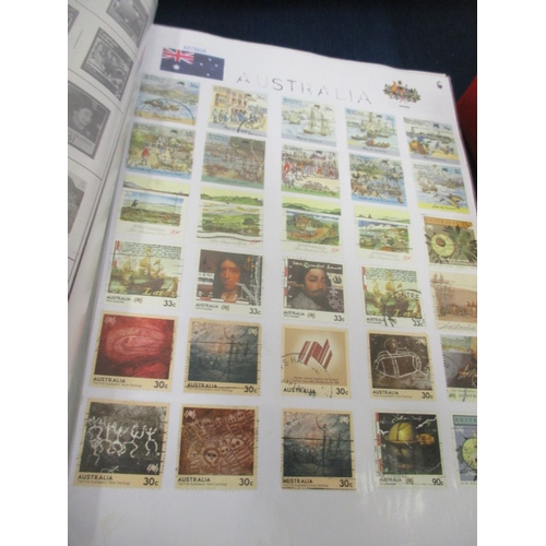 61a - 5 RED FOLDERS OF WORLD WIDE STAMPS