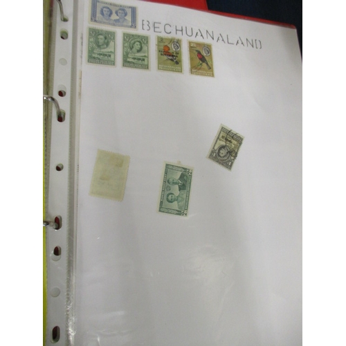 61a - 5 RED FOLDERS OF WORLD WIDE STAMPS