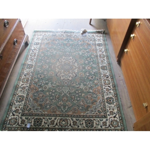 487 - GREEN AND CREAM RUG