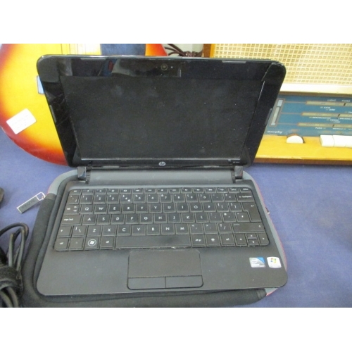 76 - HP MINI LAPTOP WITH CASE AND LEAD