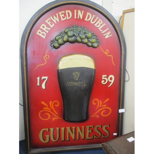 61 - PUB SIGN ARCHED WOODEN EMBOSSED GUINNESS SIGN BREWED IN DUBLIN 1759