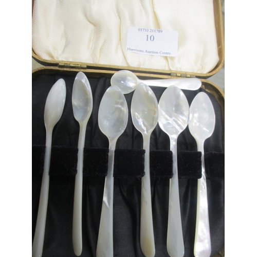 10 - CASED MOTHER OF PEARL TEA SPOONS AND A MOTHER OF PEARL MUSTARD SPOON