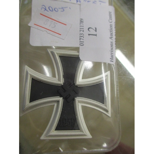 12 - GERMAN IRON CROSS, FIRST CLASS, MAKERS MARK ON PIN, BOUGHT AT POLISH FLEA MARKET.
CAVEAT EMPTOR