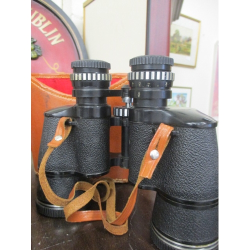 59 - BINOCULARS IN LEATHER CASE