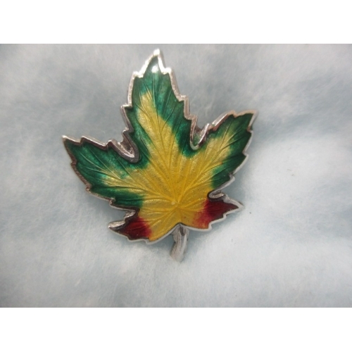 36 - STERLING SILVER AND ENAMEL MAPLE LEAF BROOCH