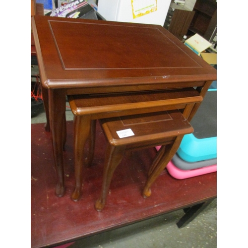 103 - NEST OF 3 MAHOGANY TABLES