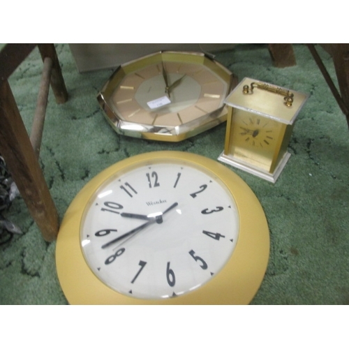 110 - 2 ROUND WALL CLOCKS AND A CARRIAGE CLOCK