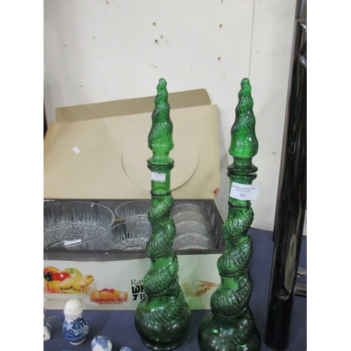 93 - 2 GREEN DECORATIVE BOTTLES WITH GLASS STOPPERS