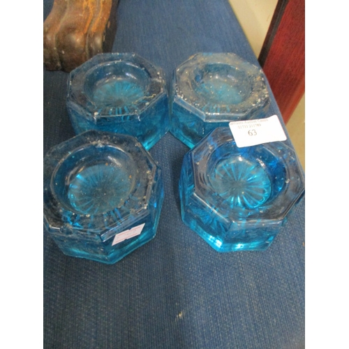 80 - SET OF FOUR BLUE GLASS COASTERS