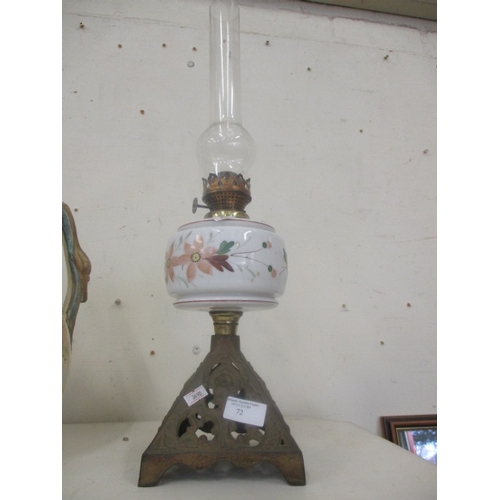 72 - DECORATIVE CAST METAL BASE AND WHITE GLASS HAND PAINTED OIL LAMP WITH CLEAR GLASS CHIMNEY