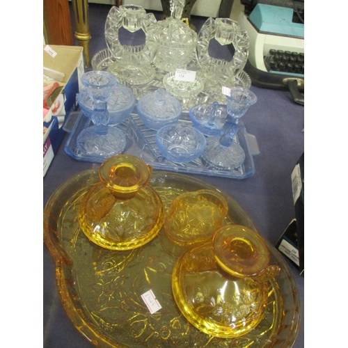 124 - 3 RETRO GLASS DRESSING TABLE SETS -  ONE CLEAR, ONE BLUE AND ONE AMBER