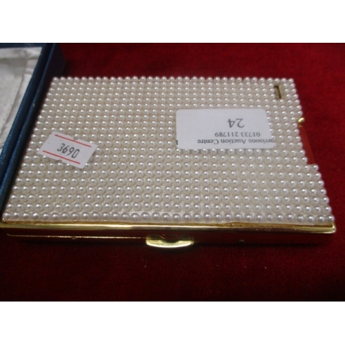 24 - GOLD COLOURED AND BALL EFFECT CIGARETTE CASE AND LIGHTER