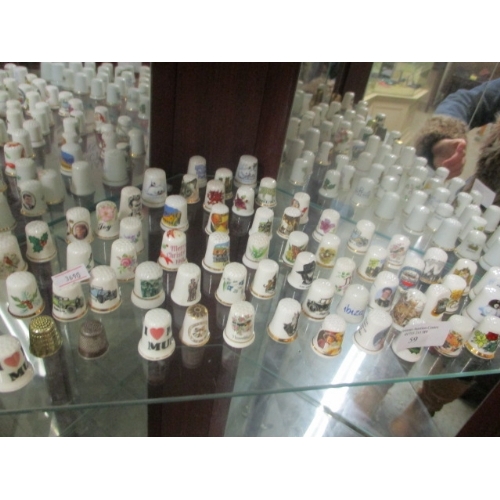 59 - LARGE COLLECTION OF THIMBLES