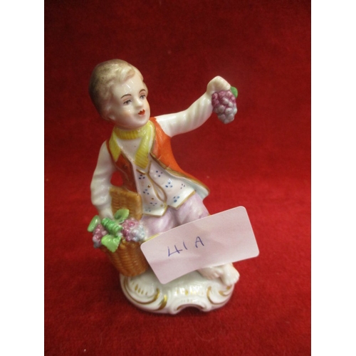 35 - PORCELAIN FIGURE OF BOY PICKNG GRAPES -  DATE MARK UNDER SITENDORF PORCELAIN GERMANY 1859