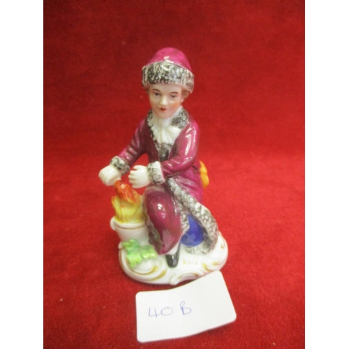 38 - PORCELAIN FIGURE - GIRL IN WINTER WARMING HER HANDS ON CAULDRON, SITENDORF PORCELAIN GERMANY 1859