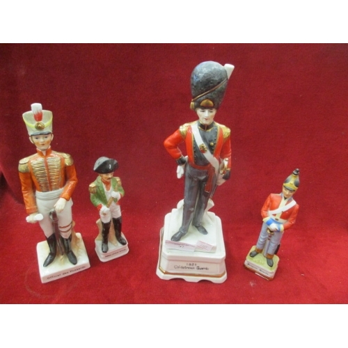 97 - COLLECTION OF 4 PORCELAIN SOLDIER FIGURES INCLUDING FRENCH CAVALRY OFFICER, 1821 COLDSTREAM GUARD, O... 