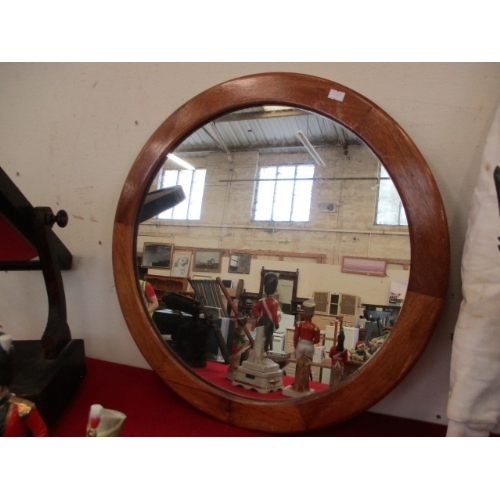 98 - A WOOD FRAMED ROUND WALL MIRROR