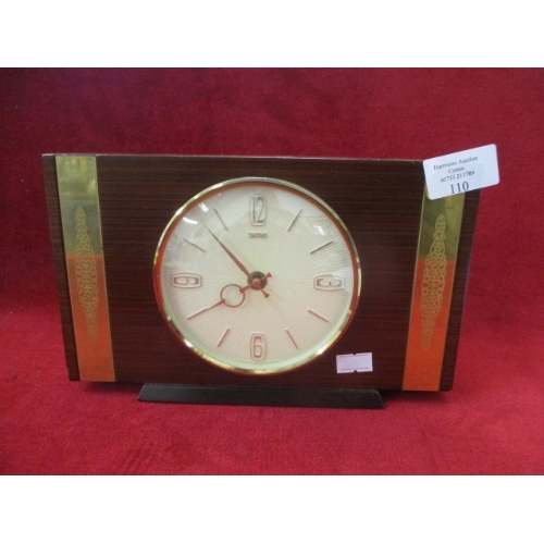 110 - VINTAGE WOOD FRAMED MANTEL CLOCK BY SMITHS