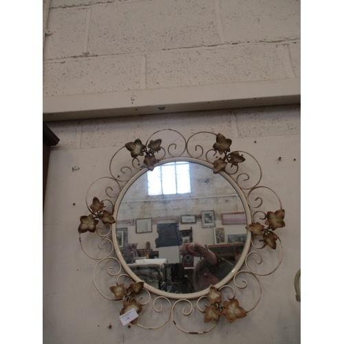 130 - WROUGHT IRON AND LEAF FRAMED ROUND MIRROR