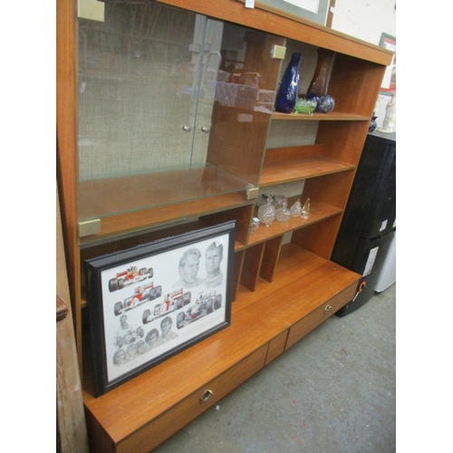 488 - A PART GLAZED WALL DISPLAY UNIT IN TEAK WITH TWO DRAWERS UNDER