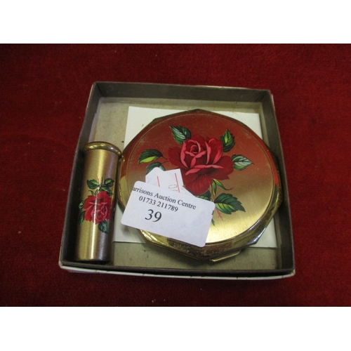 39 - STRATTON GOLD METAL COMPACT WITH ROSE PATTERN AND MATCHING LIPSTICK HOLDER