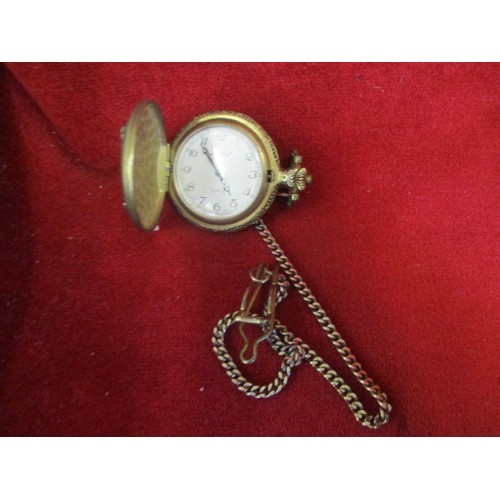 10 - POCKET WATCH ON A CHAIN IN SILVER METAL DEPICTING GOLFER ON THE CASE