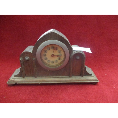 135 - SMALL OAK CASED MANTLE CLOCK