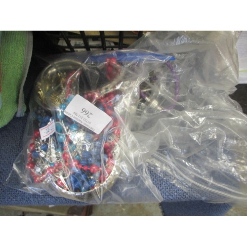 266 - BAG OF MIXED COSTUME JEWELLERY