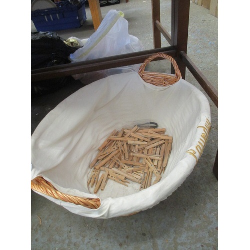 290 - WICKER LAUNDRY BASKET WITH PEGS
