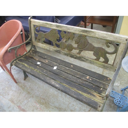 300 - EARLY CAST IRON GARDEN BENCH WITH ETHIOPIAN THEMED MOTIF WOODEN SLATTED SEAT