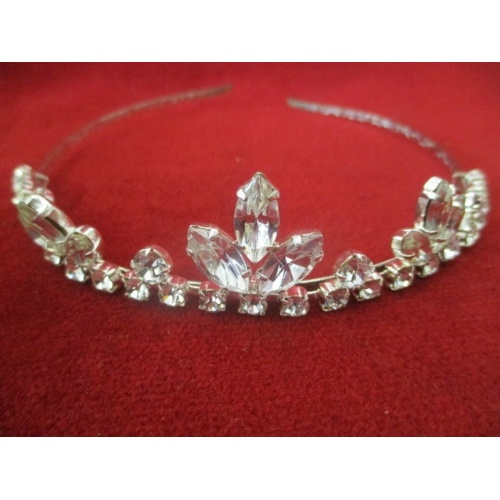 21 - GLASS STONE ENCRUSTED TIARA IN A RED CASE AND A SILK SCARF