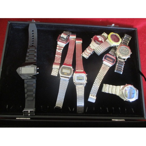 52 - DISPLAY CASE OF 9 DIGITAL GENTS WATCHES