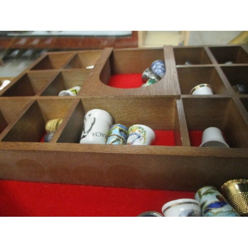 52a - LARGE COLLECTION OF THIMBLES AND SMALL DISPLAY RACKS