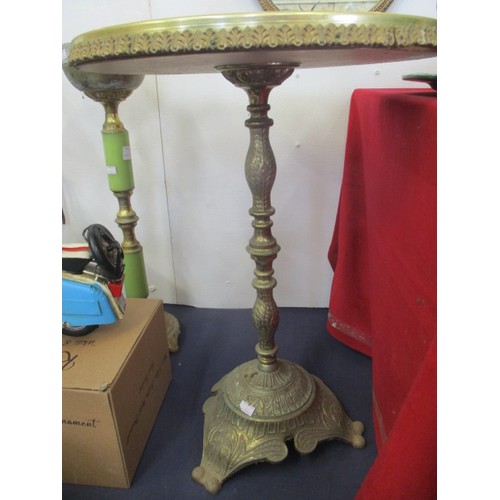 127 - AN ORNATE GOLD METAL STEMMED TABLE