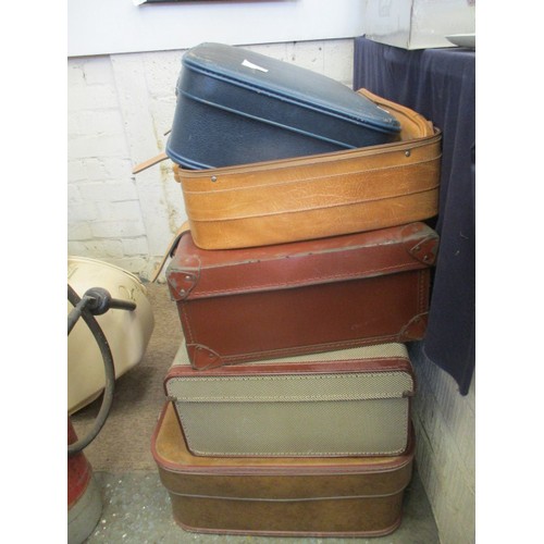 162 - 5 STAGGERED SIZED VINTAGE SUITCASES