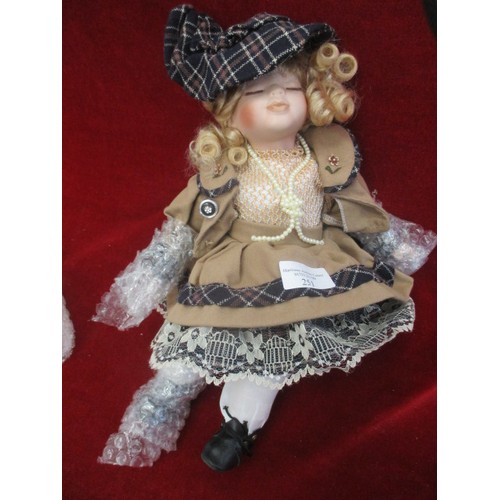 251 - NEW DOLL WITH PORCELAIN FACE, HANDS AND FEET