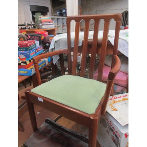 355 - RETRO TEAK FRAMED CARVER CHAIR WITH GREEN SEAT PAD