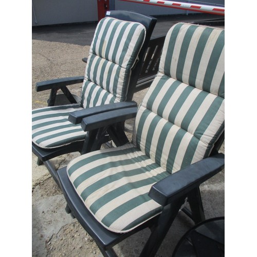 458 - PAIR OF GREEN PLASTIC RECLINING DECK CHAIRS WITH PADS