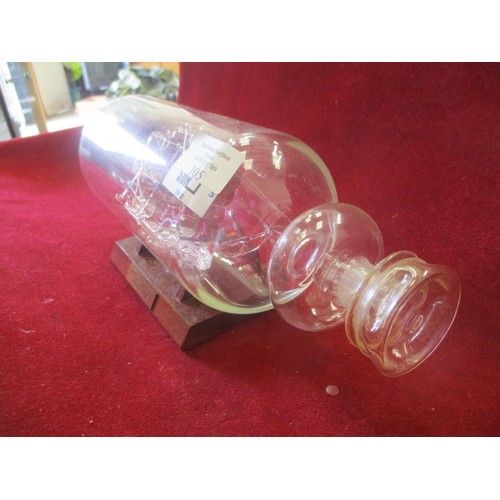 105 - GLASS SHIP ' CUTTY SARK' IN BOTTLE ON STAND