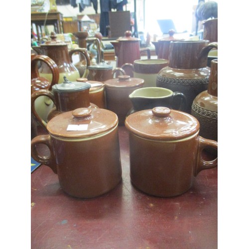 243 - COLLECTION OF BROWN POTTERY JUGS, JELLY MOULDS AND MORE