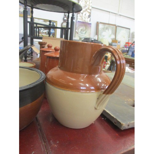 243 - COLLECTION OF BROWN POTTERY JUGS, JELLY MOULDS AND MORE