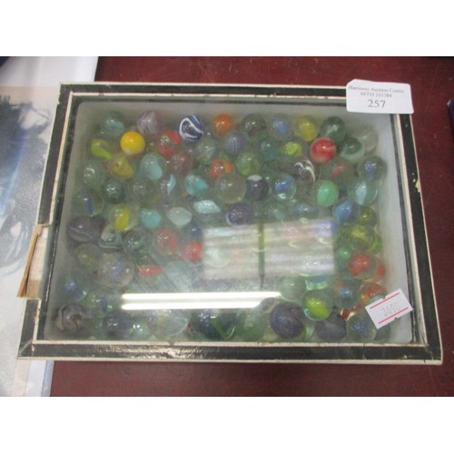 257 - BOX OF MARBLES