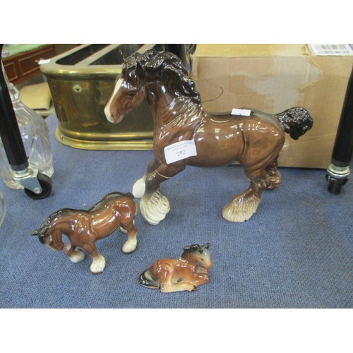 292 - BESWICK SHIRE HORSE ( REPAIRED LEG) PLUS A SMALLER ONE AND A  FOAL