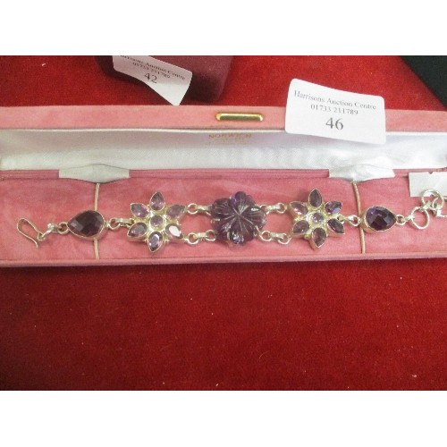 46 - A LARGE CONTEMPORARY STYLE 925 SILVER AND PURPLE STONE BRACELET IN AN ALEKS OF NORWICH BOX