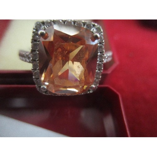 49 - SILVER DRESS RING WITH LARGE SQUARE CUT PEACH MORGANITE COLOUR STONE. SIZE O/P